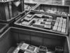 Raw minimalist door lock die-casting parts in workshop