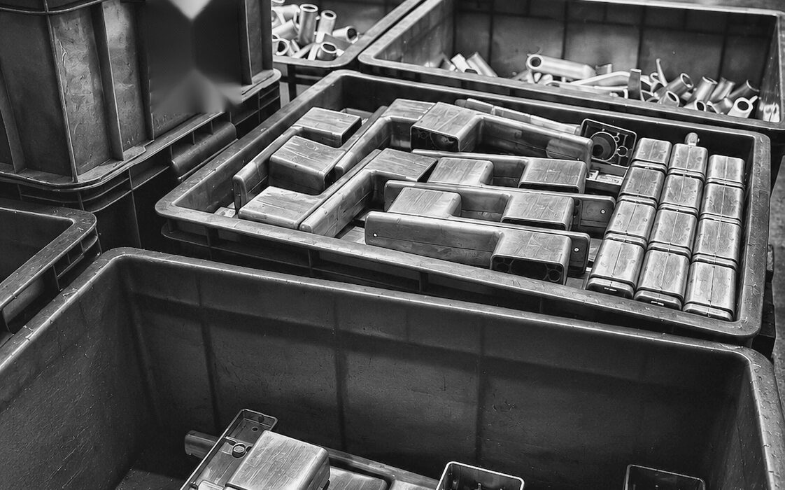 Raw minimalist door lock die-casting parts in workshop